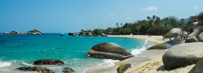 tropical beach with turquoise water at tayrona natural park