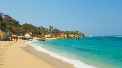 Naklejka premium tropical beach with turquoise water at tayrona natural park