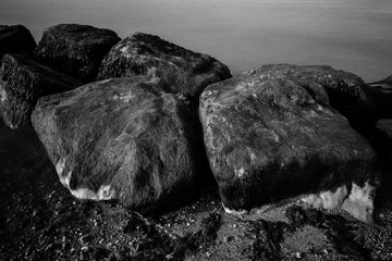 black and white rocks by the sea
