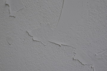 house facade, wall with flaky plaster