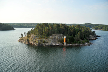 rocky island in the Baltic sea with lighthouse