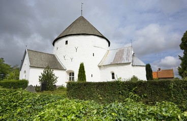 Fototapeta na wymiar Defensive round church in Nylars, Bornholm, Denmark