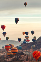 Naklejka premium Mountain landscape with large balloons in a short summer season at dawn.