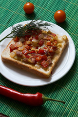 sandwich with ham red pepper and tomato egg