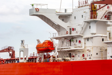 View of modern safety lifeboat carried by a cruise ship for use in emergency evacuation