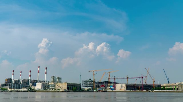 4K:Time-lapse: Crane building site. Power Plant Construction