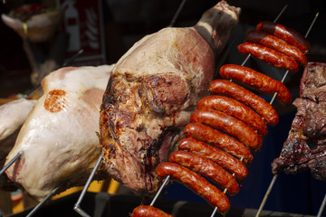 Meat on a rotisserie grill