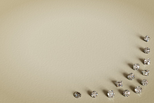 Textured old beige paper with antique cut diamonds scattered along the corner. 3D rendering