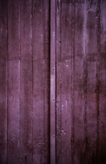 Old wooden door with metal