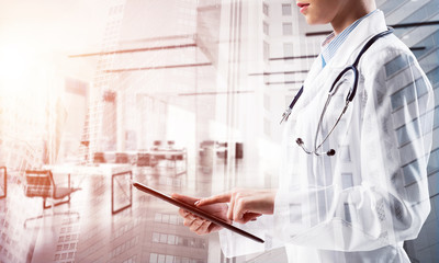Successful doctor and modern technologies.