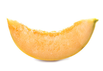 Slice of tasty ripe melon on white background