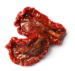 Tasty sun dried tomatoes on white background, top view
