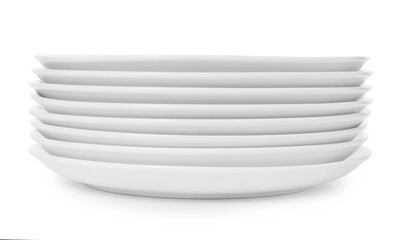 Stack of clean plates on white background. Washing dishes