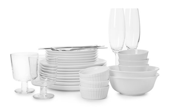 Set of clean tableware on white background. Washing dishes