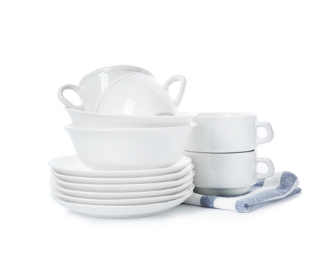 Set of clean tableware on white background. Washing dishes