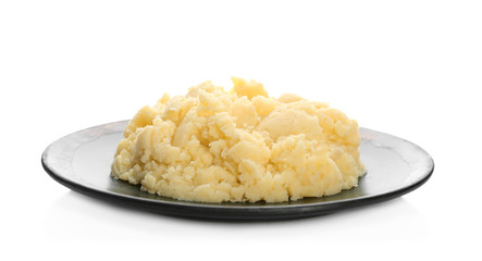 Plate with mashed potatoes on white background
