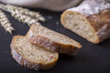 Ciabatta with ears on the black  table.