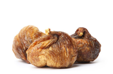 Delicious dried fig fruits on white background. Organic snack