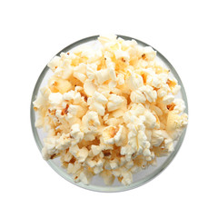 Bowl with delicious fresh popcorn on white background, top view