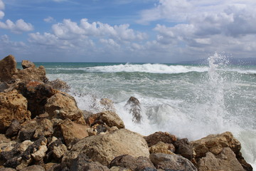 waves crashing on rocks
