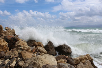 waves crashing on rocks