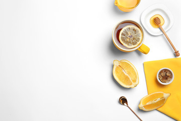Composition with lemon tea on white background, top view. Space for text