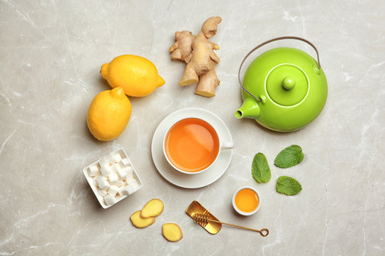 Composition with lemon tea on table, top view