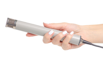 Microphone in hand on white background isolation