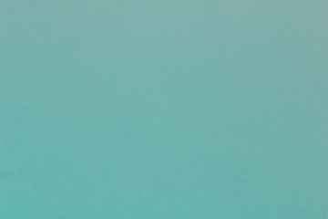 The texture of the cardboard is turquoise. Abstract turquoise background