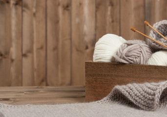 Obraz na płótnie Canvas Yarn Balls. Wooden Knit Needles. Knitting Accessories.