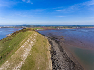 Dramatic Limestone Cliffs of Brean Down, part of the Mendip Hills, in the Late Afternoon Sun in Autumn on the Bristol Channel in Somerset, England, UK