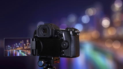 Digital camera on bokeh background 1