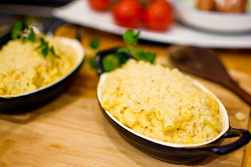 Mac and Cheese in cozy kitchen autumn and fall comfort foods cooking background