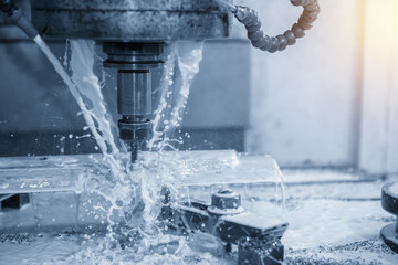 The CNC milling machine cutting the injection mold part with the solid ball endmill tool.The precision  mold cutting . © Pixel_B