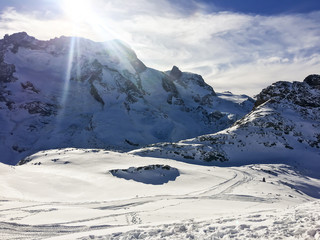 Landscape and nature at Grindelwald valley with clouds,blue sky and snow covered in winter season alpine Switzerland.