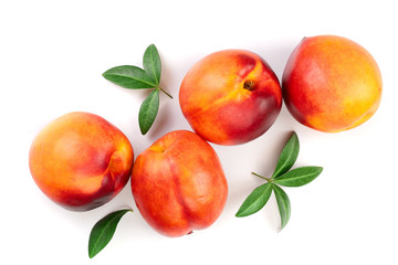 ripe nectarine with leaves isolated on white background. Top view. Flat lay pattern