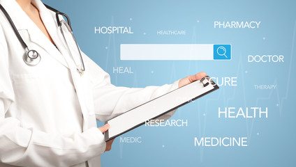 Female doctor holding notepad with blue background and search bar with hovering medical words