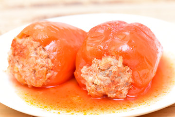 Stuffed pepper with meat, rice and carrots. Healthy food. Restaurant dish.