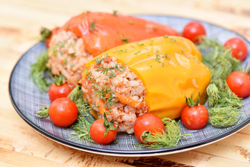 Stuffed pepper with meat, rice and carrots. Healthy food. Restaurant dish.