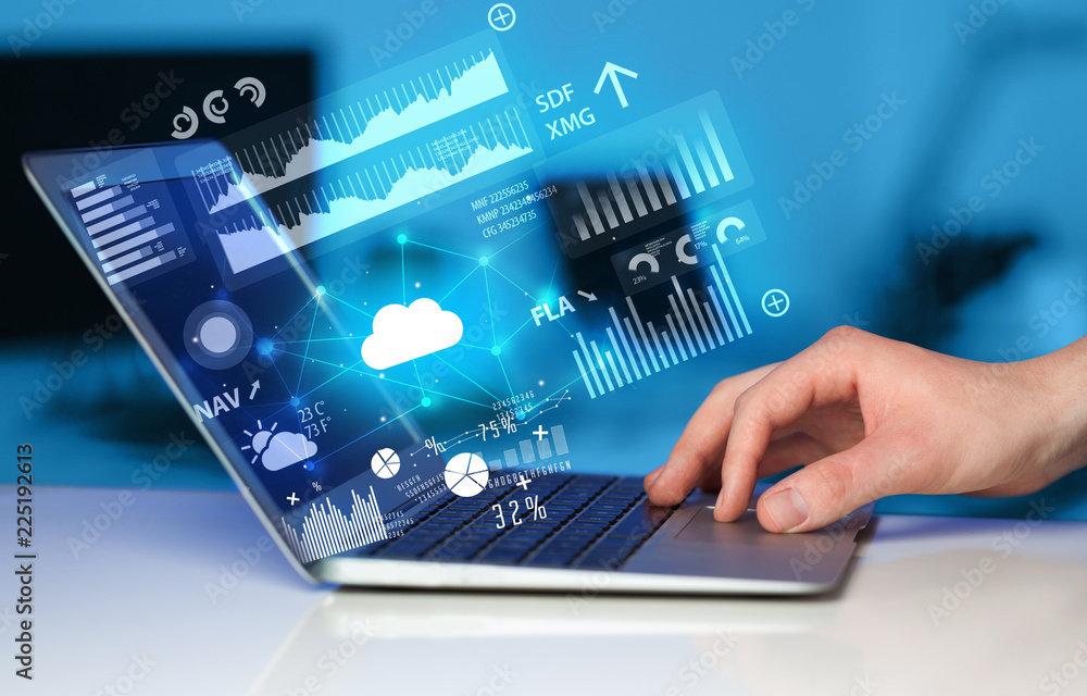 Aufkleber hand using laptop with cloud technology and linked information concept