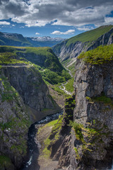 Amazing nature view with fjord and mountains. Beautiful reflection. Location: Scandinavian Mountains, Norway. Artistic picture. Beauty world. The feeling of complete freedom