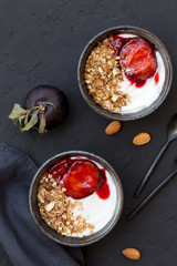 Home made granola with yogurt and caramelized plums