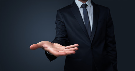 Businessman without head holding something without theme