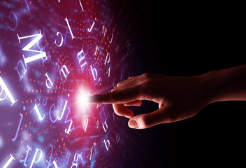 Female finger touching a beam of light surrounded by a pink background with alphabet letters