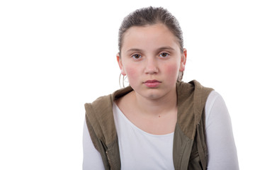 portrait of an unhappy teenager on a white background