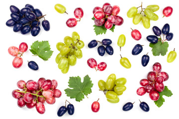 green pink and blue grapes with leaves isolated on the white background. Top view. Flat lay pattern