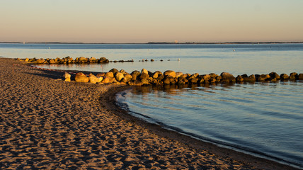 Obraz premium Goldene Abendstimmung am Meer