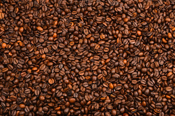 Coffee beans background. Top view. Coffee beans texture.