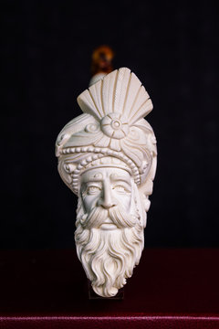 Hand Carved White Meerrschaum Pipe on Black Background