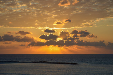 sky sunrise behind clouds